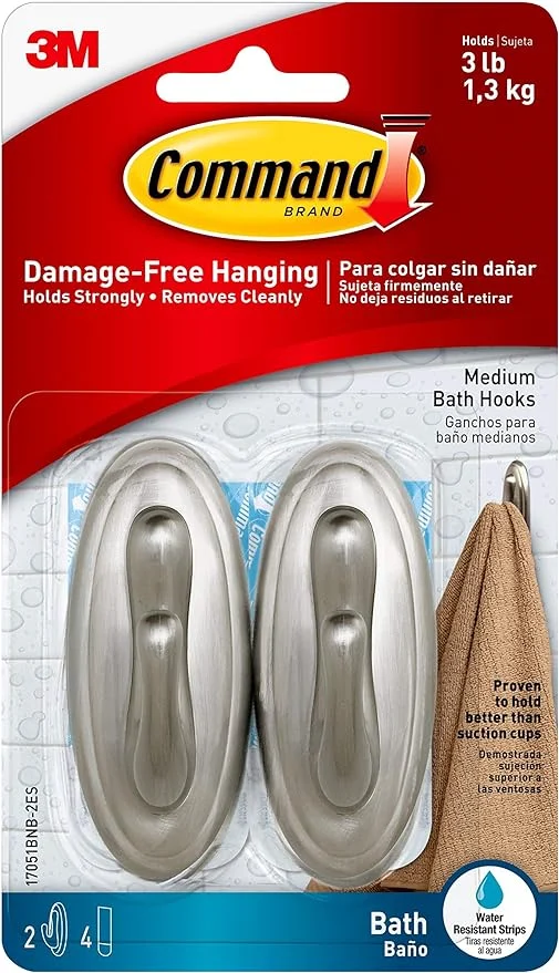3M command hooks to install shower curtain rods without drilling.