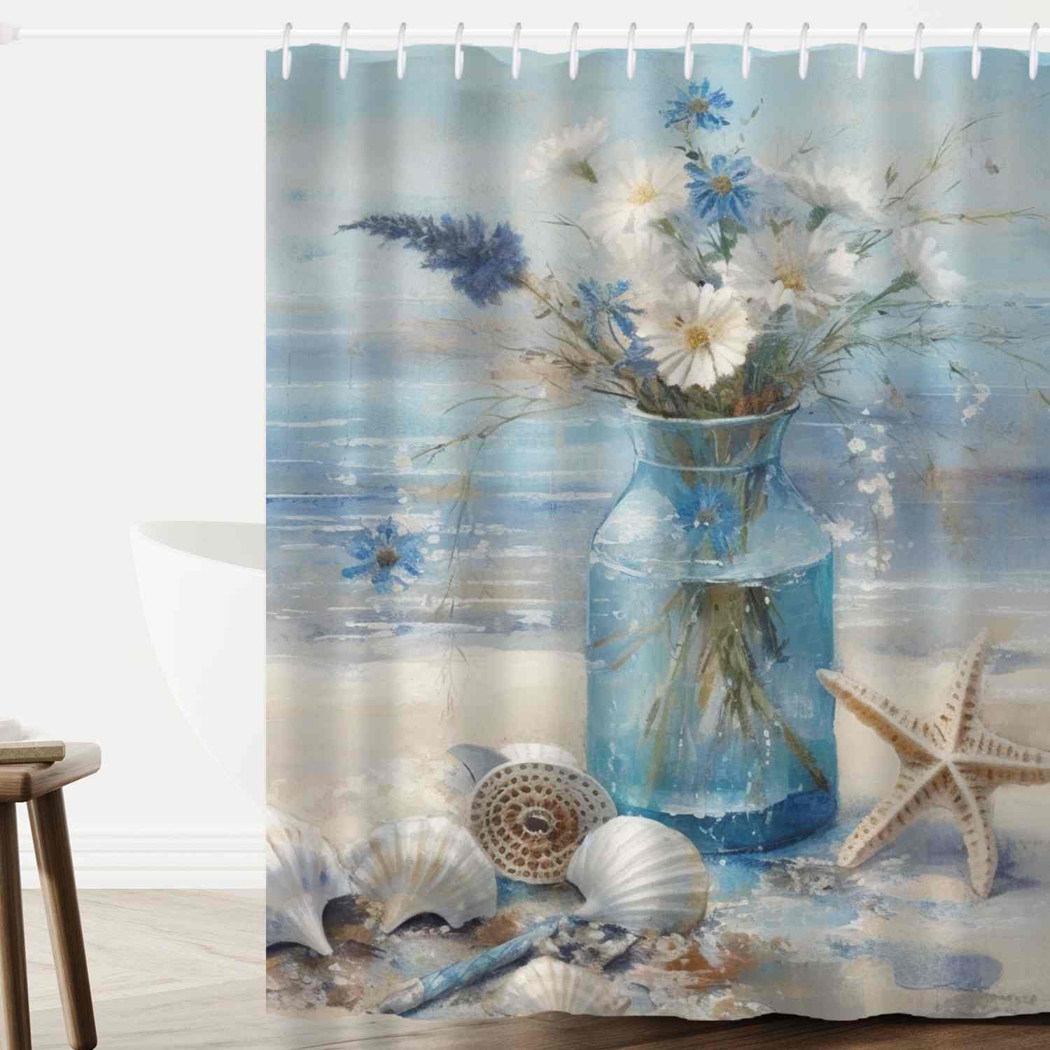 A blue shower curtain with seashells and flowers.