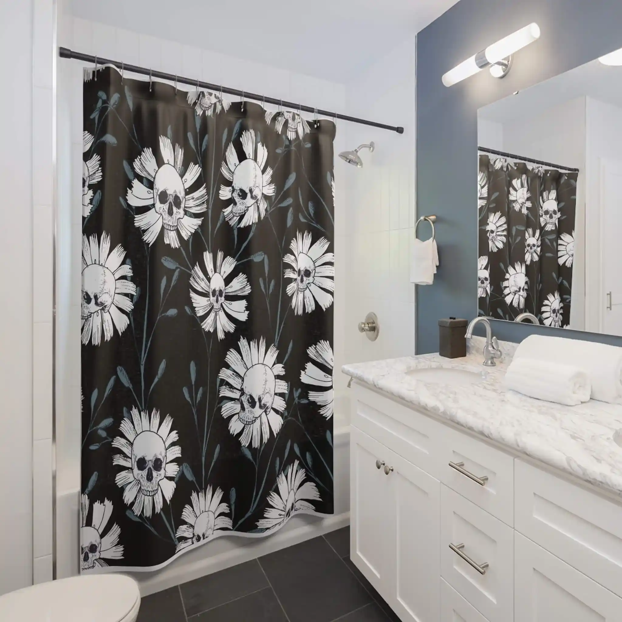 Guest bathroom shower curtain ideas: A bathroom with a black and white shower curtain.