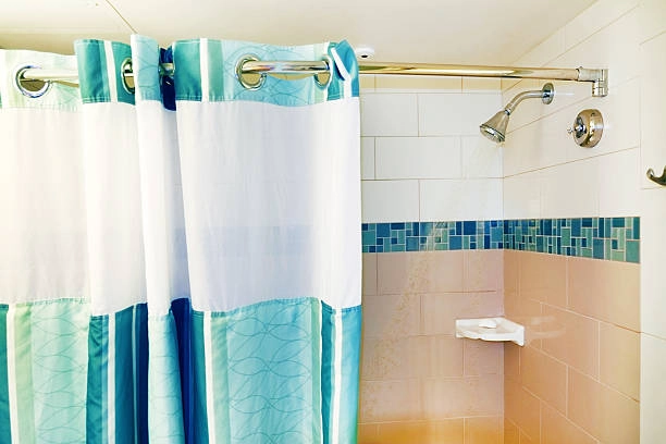 How to get mold off a blue and white shower curtain.