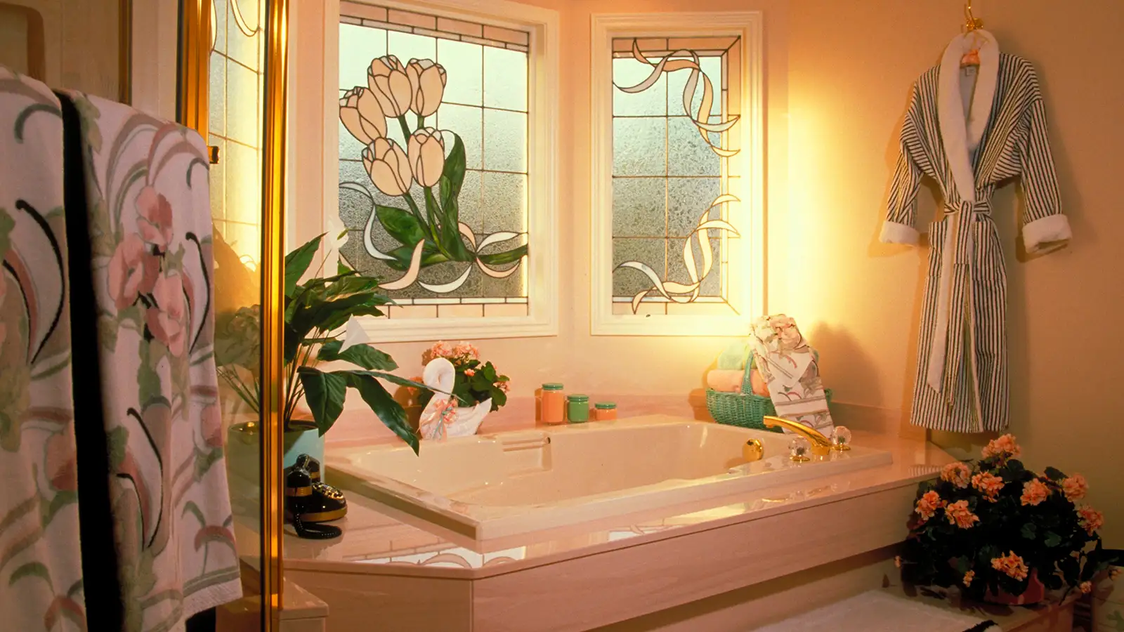Small bathroom counter decorating ideas: a bathroom with a stained glass window.