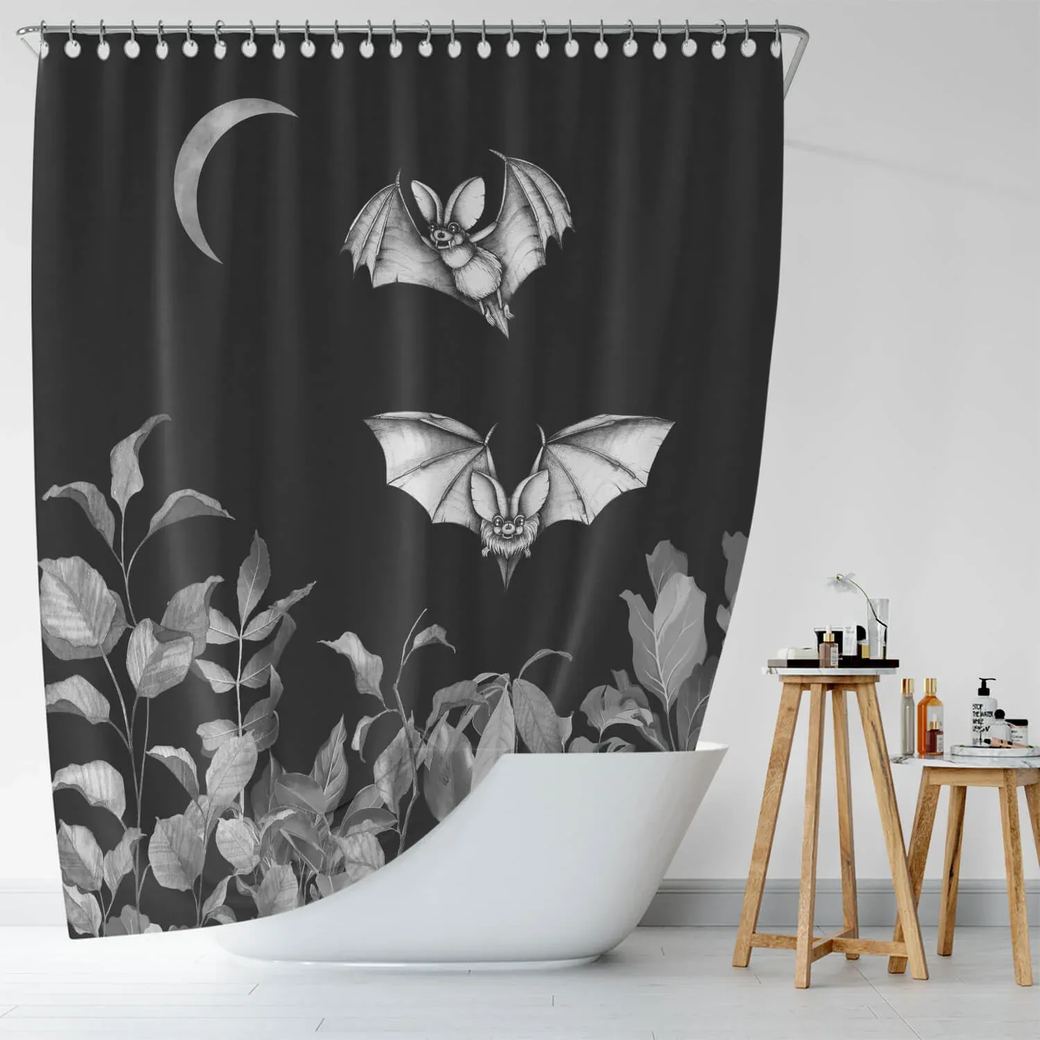 Unique Shower Curtains for Small Bathrooms: A black and white shower curtain with bats on it.