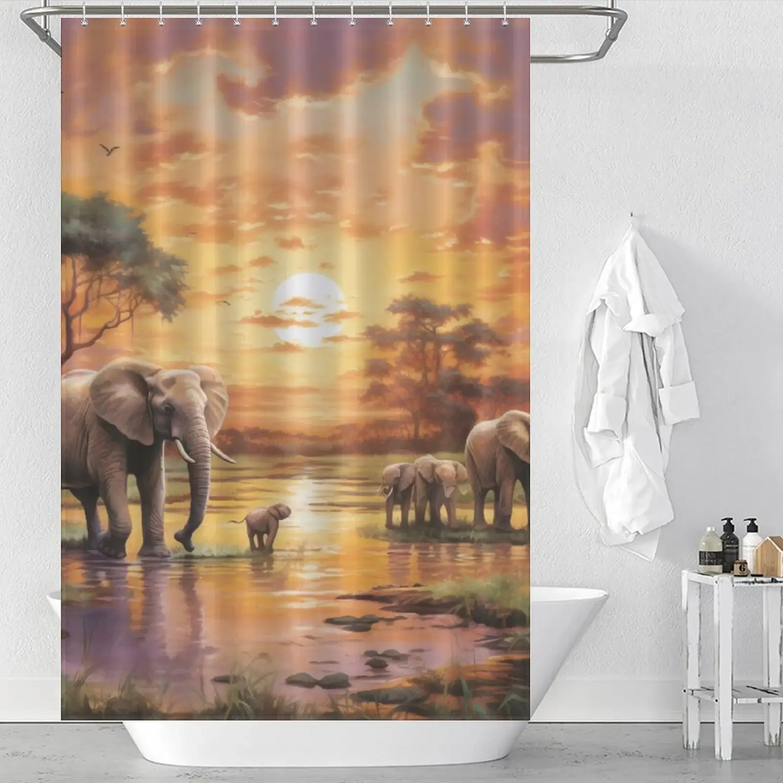 Unique Shower Curtains for Small Bathrooms: A shower curtain with elephants in the water at sunset.